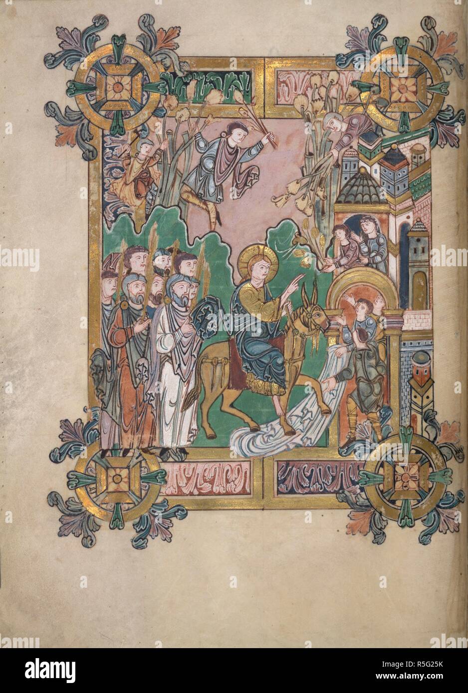 The Entry into Jerusalem. Benedictional of St. Aethelwold. Winchester; 971-984. [Whole folio] Preface to the blessing for Palm Sunday. Christ is astride a donkey, and followed by a group of people with golden palm branches. Two youths at the city gate spread mantles under the donkey's feet, and above them other figures lean out from the city walls or are up a tree throwing flowers. The scene is surrounded by frame of 'Winchester' acanthus, with round bosses at each corner  Image taken from Benedictional of St. Aethelwold.  Originally published/produced in Winchester; 971-984. . Source: Add. 49 Stock Photo