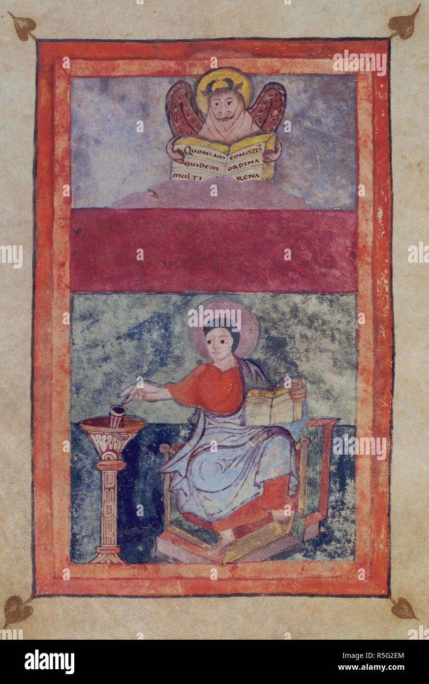 St Luke seated, depicted as a scribe, with his symbol, the bull, holding a book inscribed with the opening words of his gospel. Gospels. Carolingian Empire, France [Tours]; between 820 and 830. Source: Add. 11848, f.109v. Language: Latin. Stock Photo