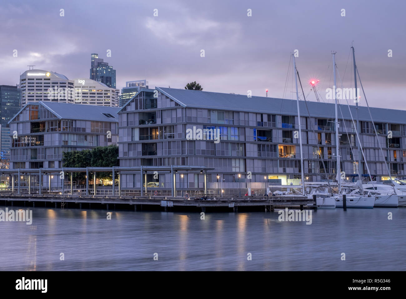 Old pier warehouse turned into luxury apartments Stock Photo - Alamy