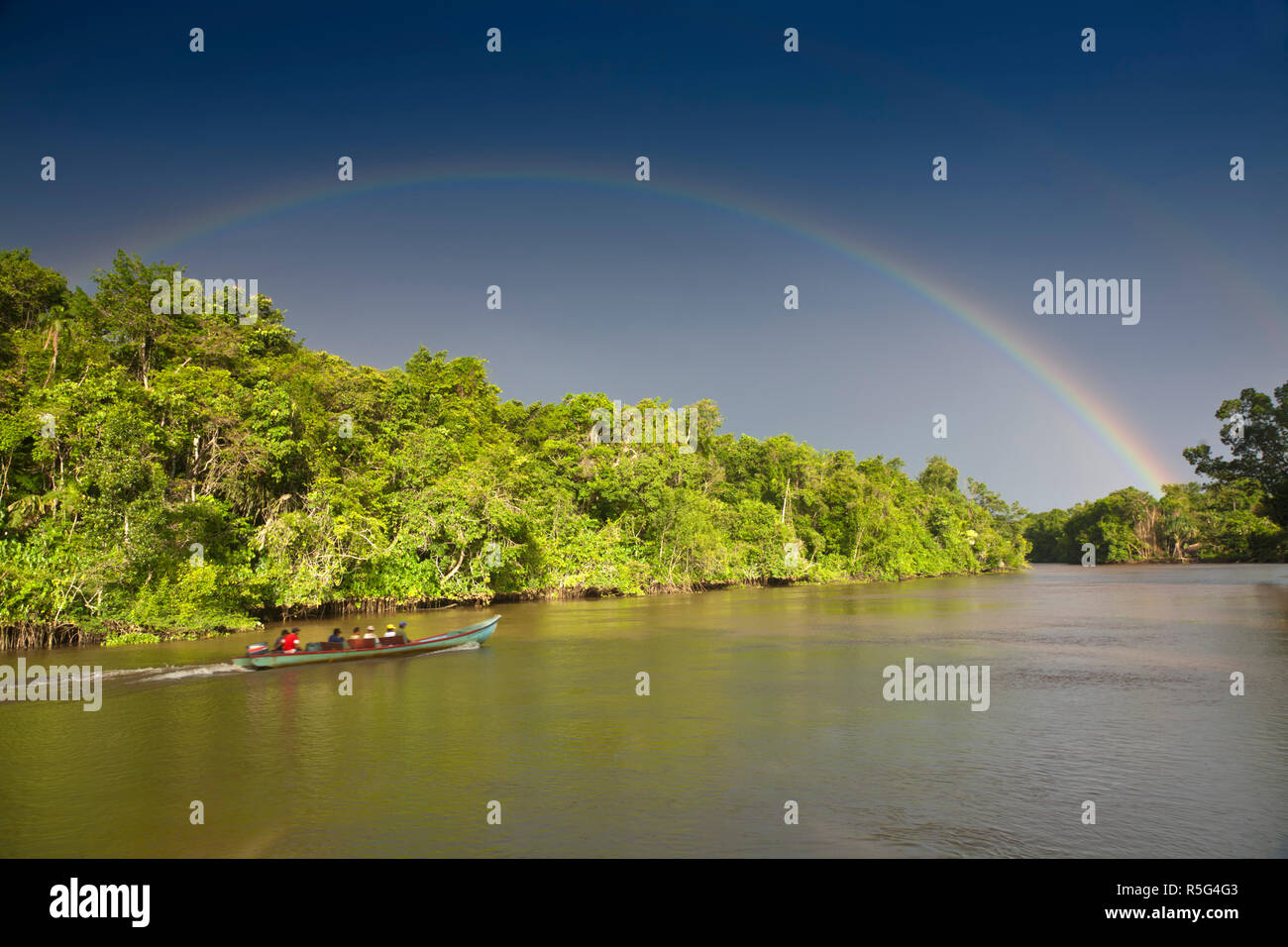 Venezuela, Delta Amacuro, Orinoco Delta, Rainbow over Nararina river Stock Photo