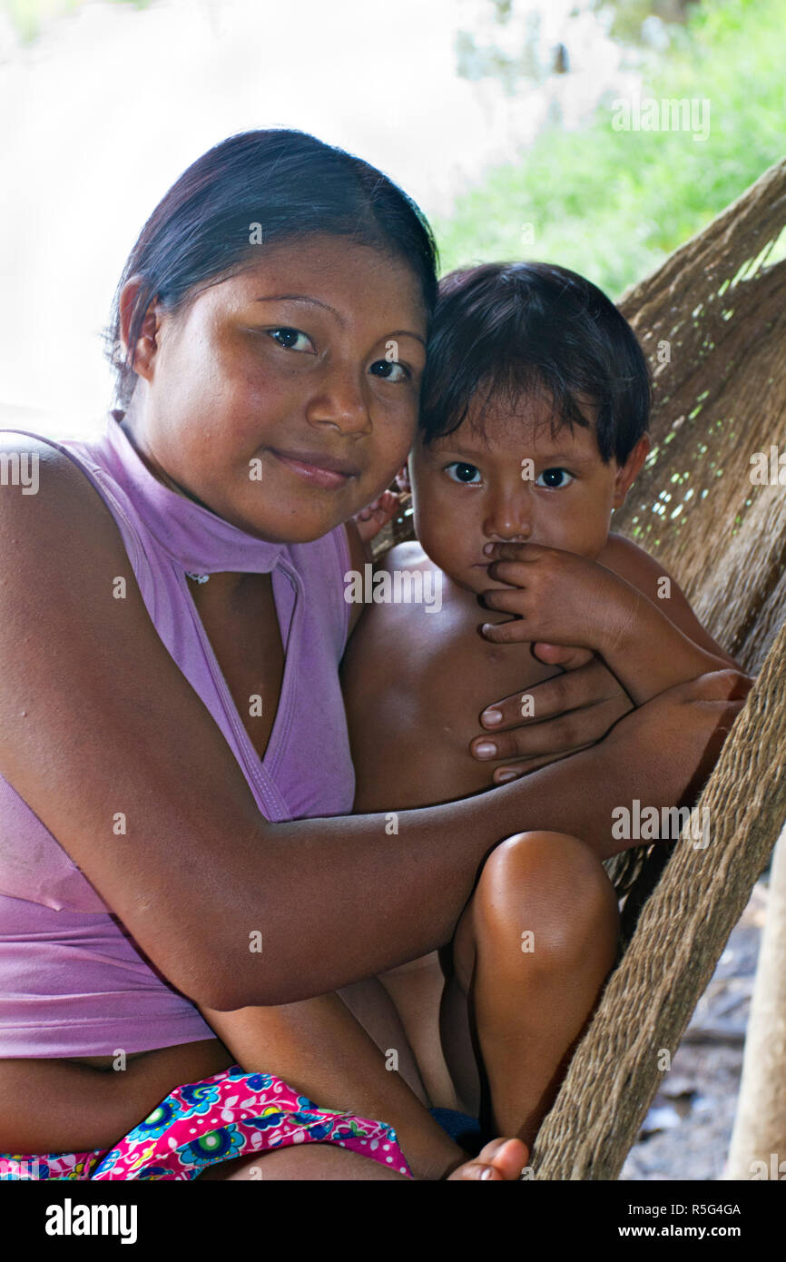 Venezuela, Delta Amacuro, Orinoco Delta, Warao Woman and baby in hammock Stock Photo