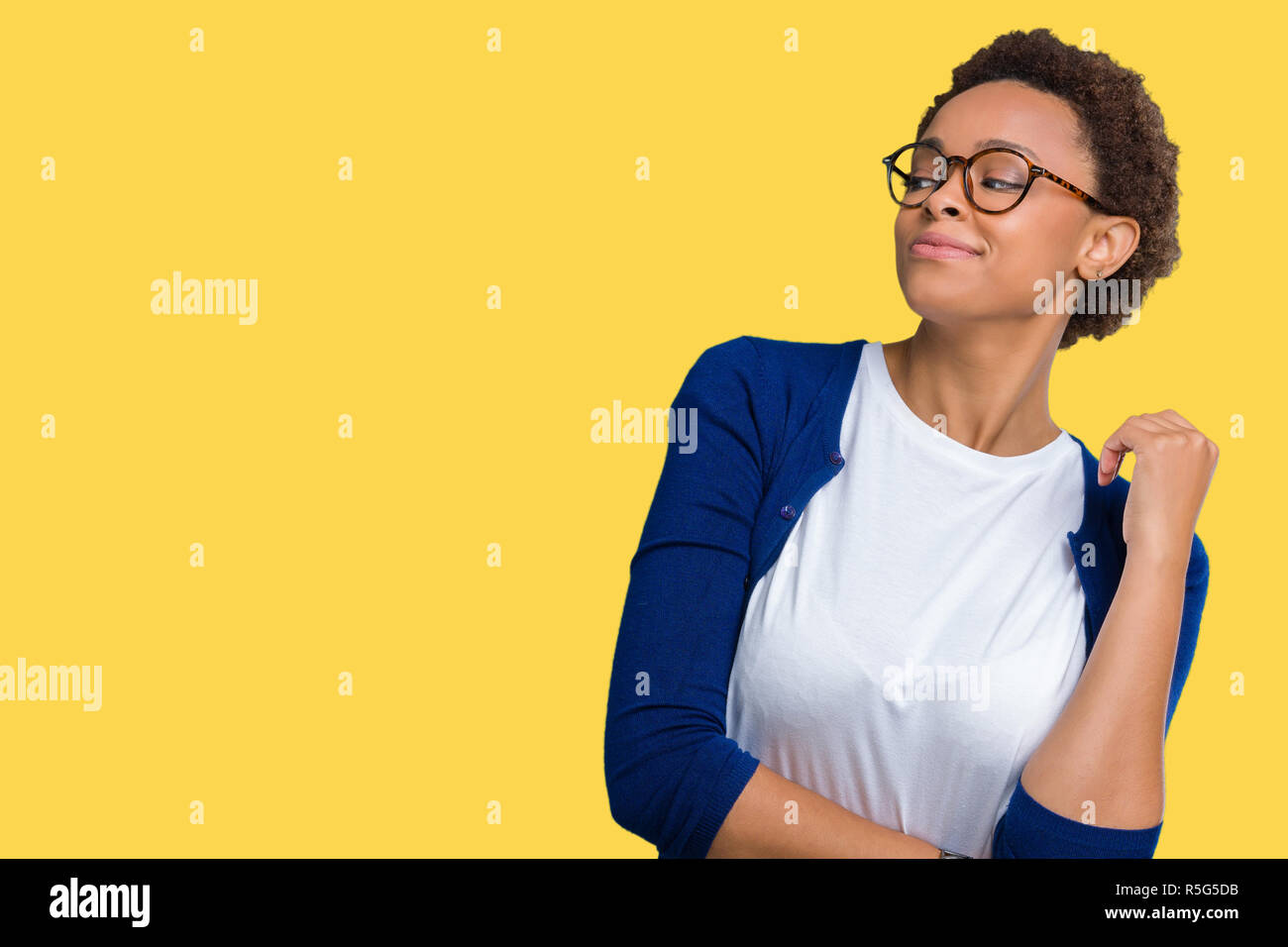 Young beautiful african american woman wearing glasses over isolated ...