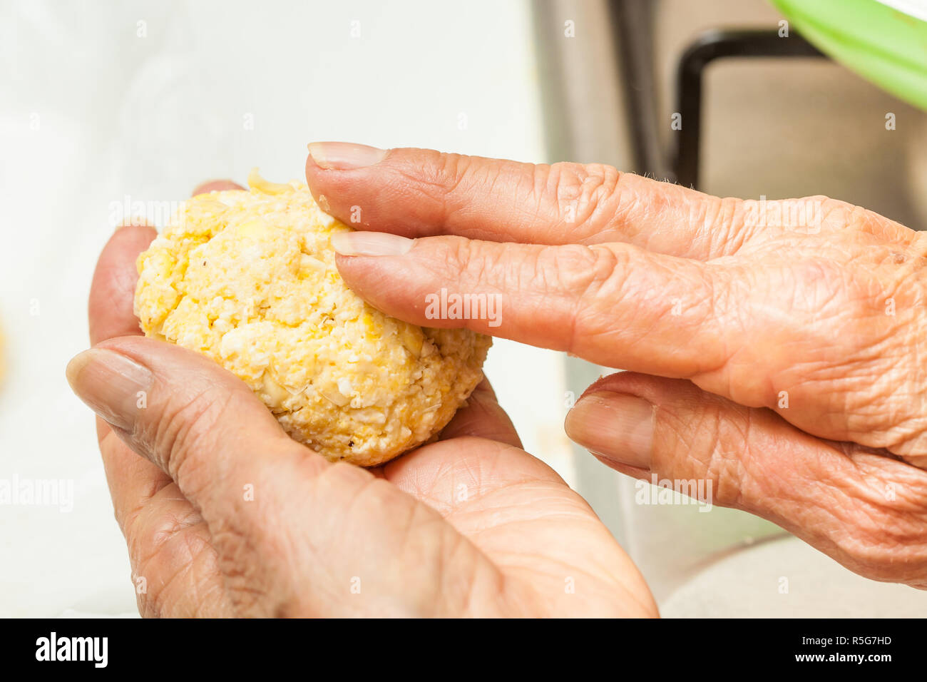 Form corn dough into medium sized balls Stock Photo Alamy