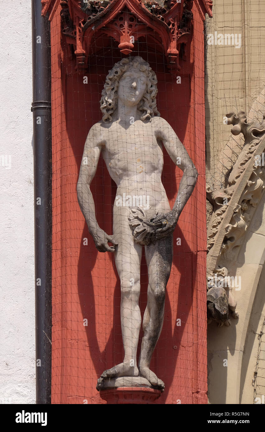 Statue of Adam on the portal of the Marienkapelle in Wurzburg, Bavaria, Germany Stock Photo