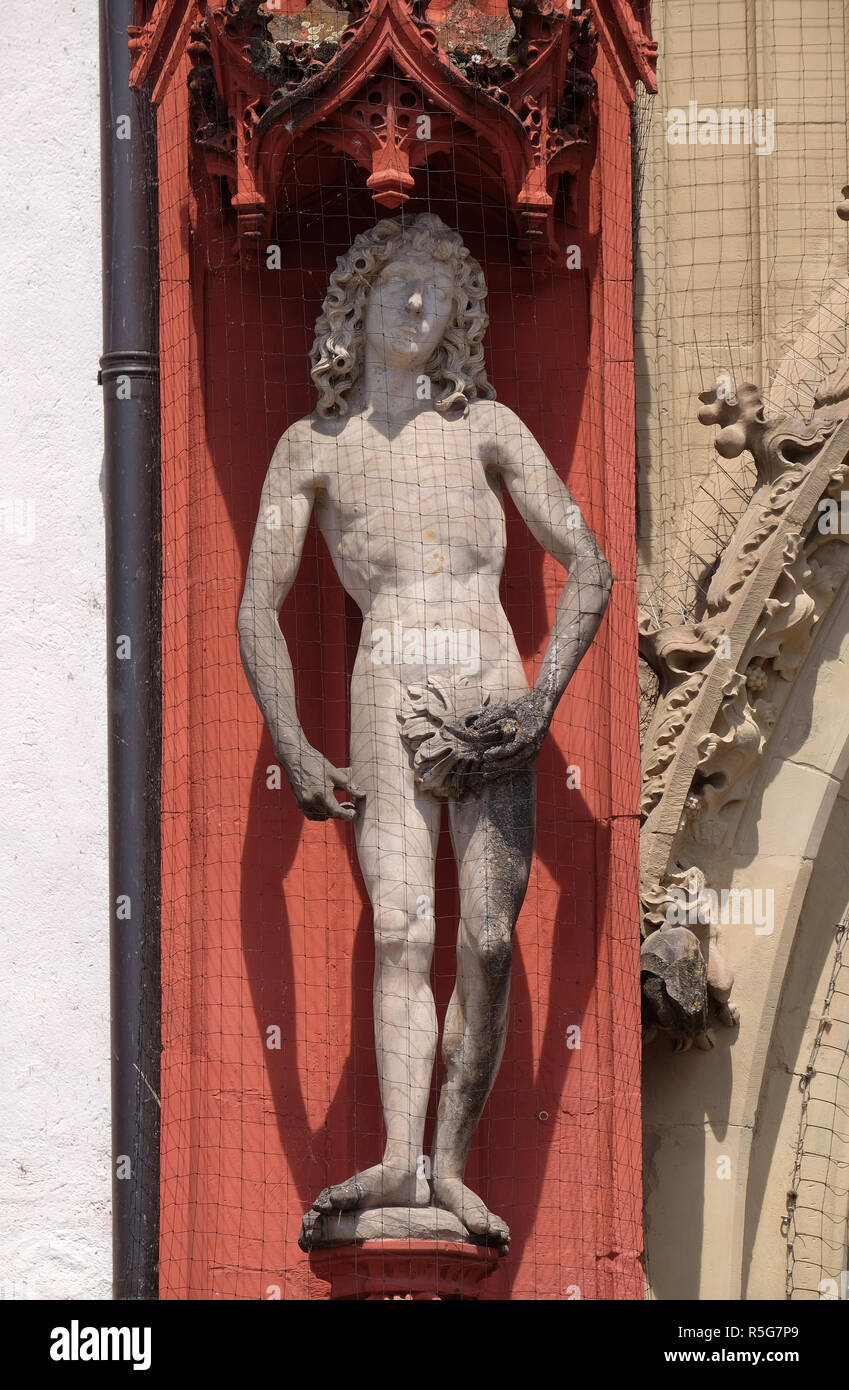 Statue of Adam on the portal of the Marienkapelle in Wurzburg, Bavaria, Germany Stock Photo