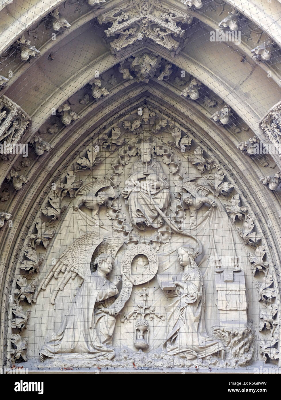 The tympanum shows the Annunciation to Mary, portal of the Marienkapelle in Wurzburg, Bavaria, Germany Stock Photo