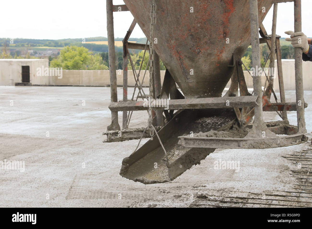 Workers At The Construction Site Poured Concrete Floor Stock Photo