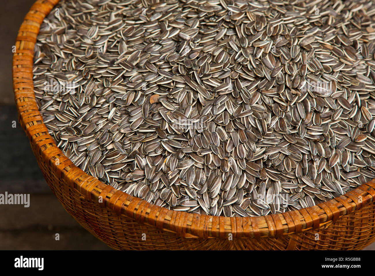 Sunflower seeds in basket, Old Quarter, Hanoi, Vietnam Stock Photo Alamy