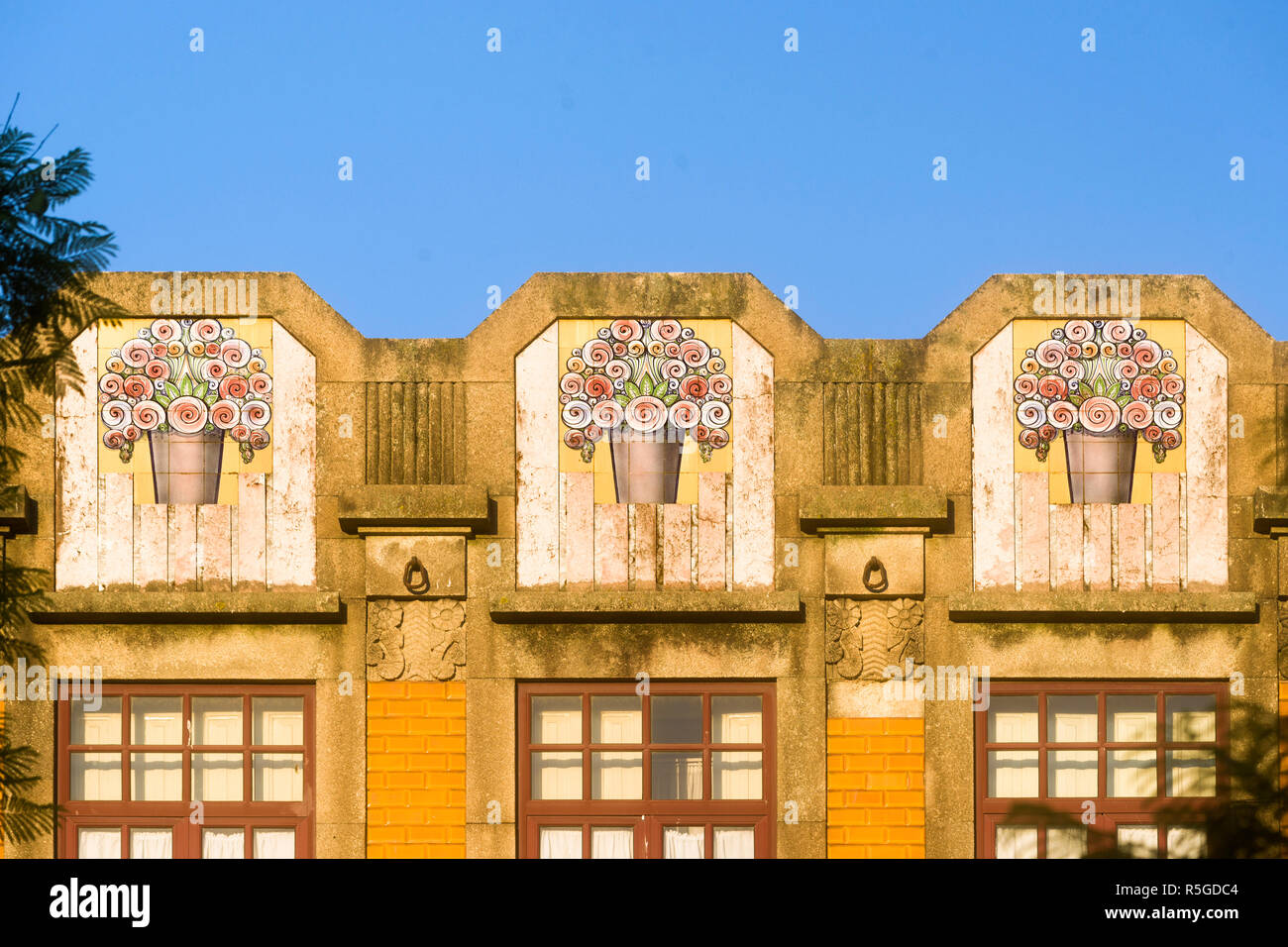 art deco pediment on a house in Porto, Portugal Stock Photo - Alamy