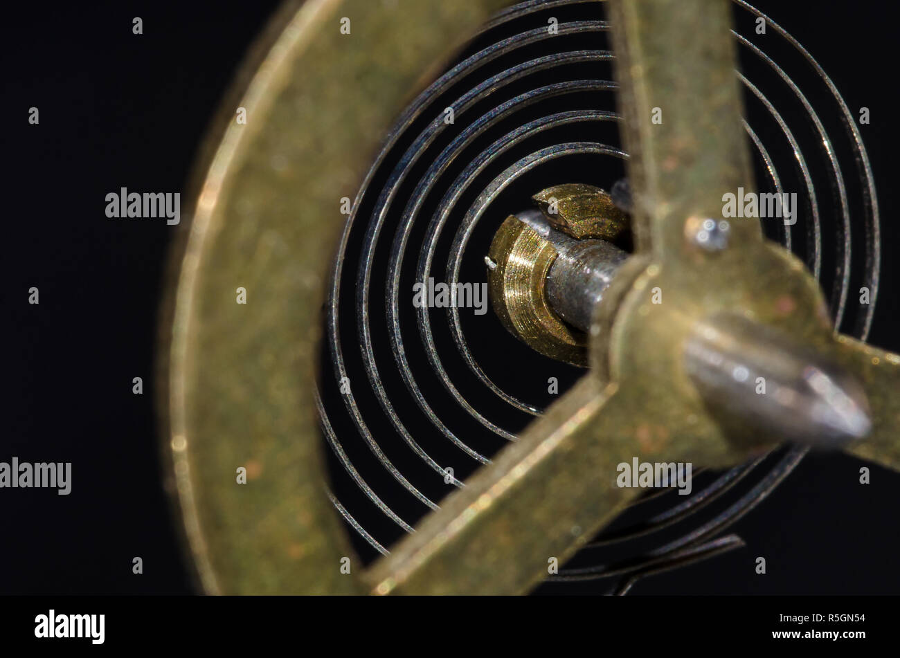 Abstract: Looking Through a Vintage Metallic Balance Wheel to Its ...