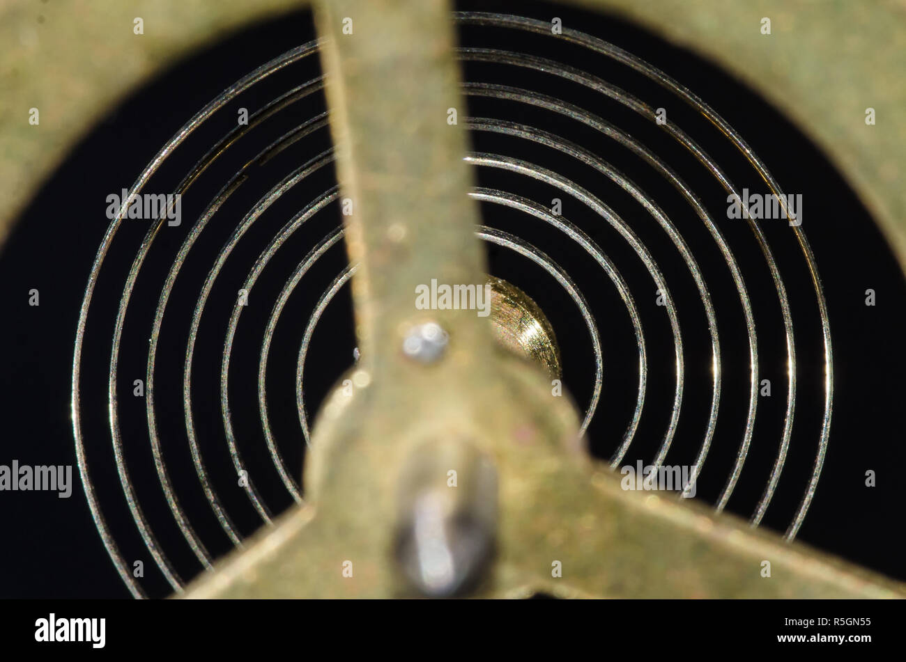 Abstract: Looking Through a Vintage Metallic Balance Wheel to Its ...