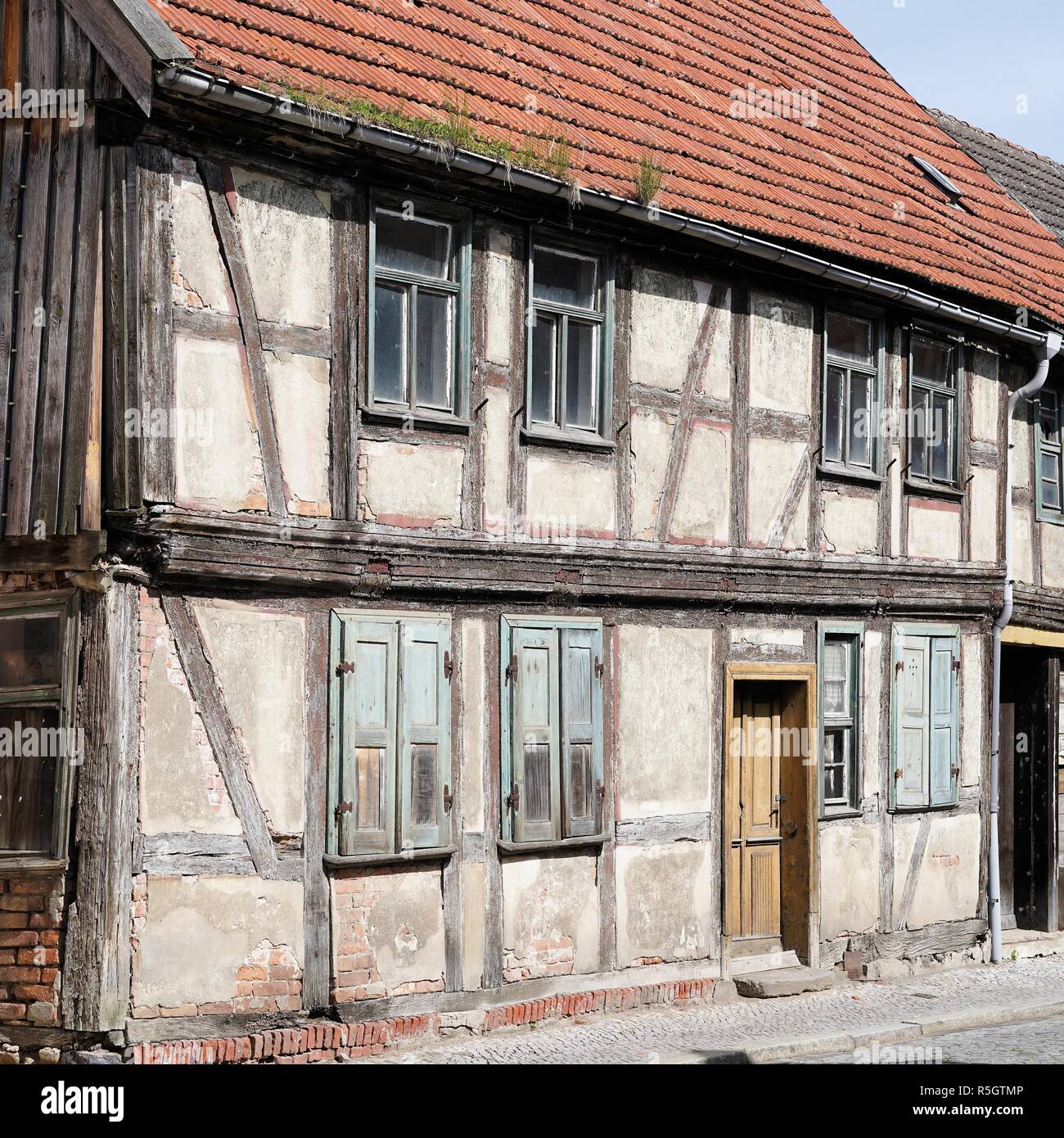 old dilapidated uninhabited half-timbered house in the old town of tangermÃ¼nde Stock Photo