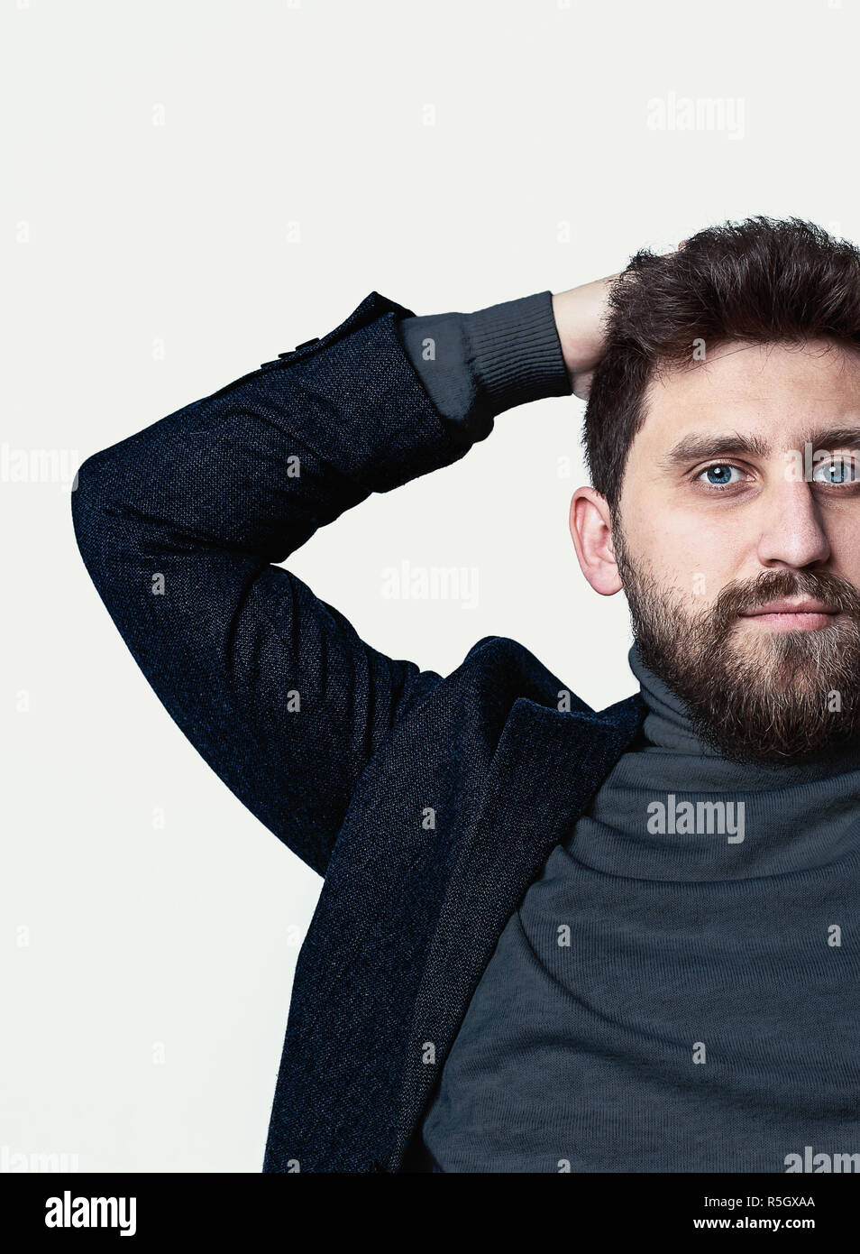 The young man looking at camera Stock Photo - Alamy