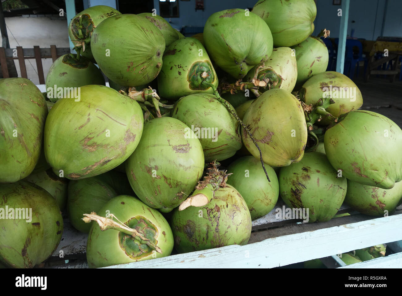 Fresh coconuts in the market Stock Photo Alamy