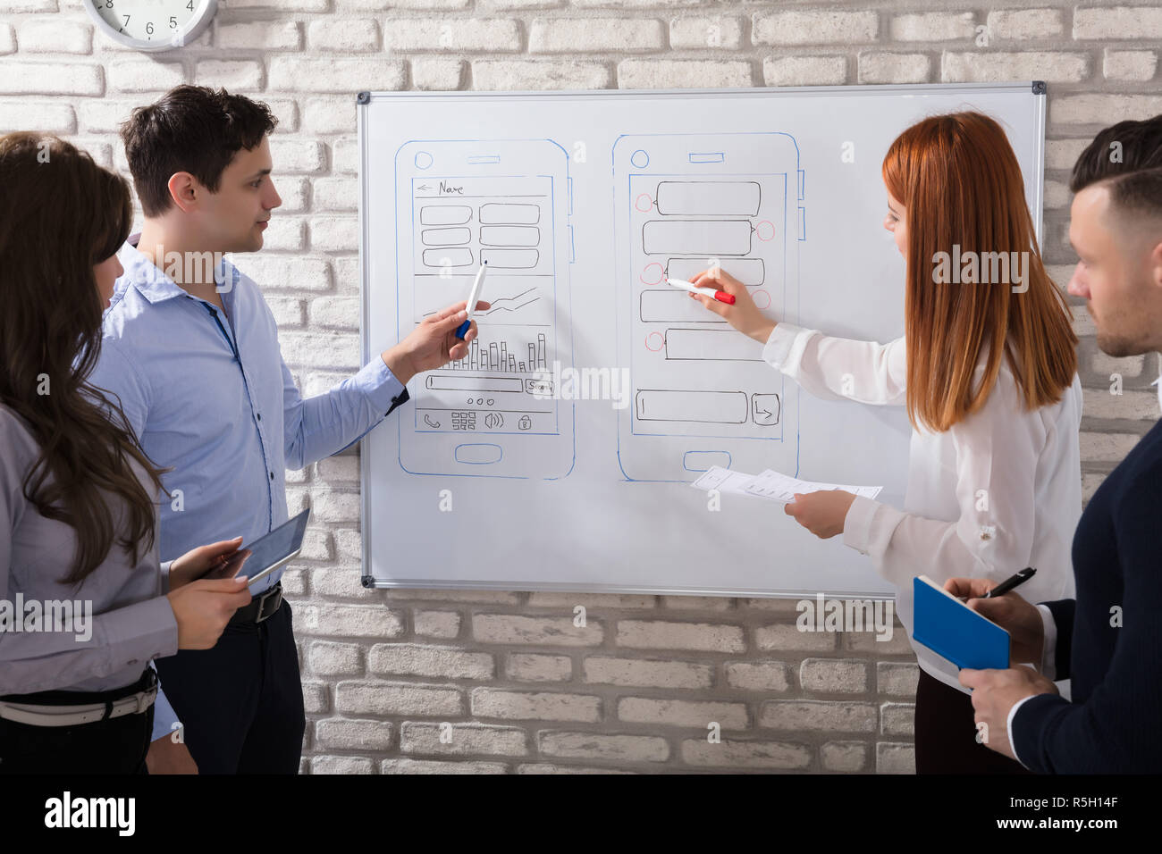 Designer Working At New Mobile Applications Stock Photo
