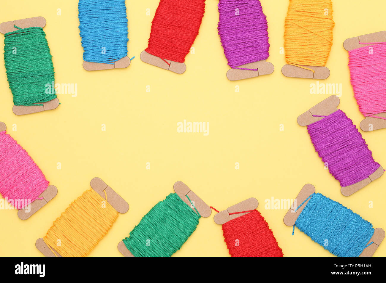 colorful thread spools needlework, craft, sewing and tailoring