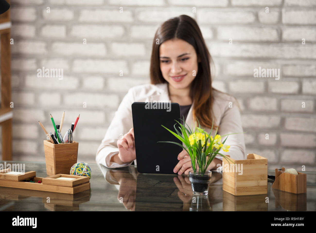 Businesswoman Using Digital Tablet Stock Photo