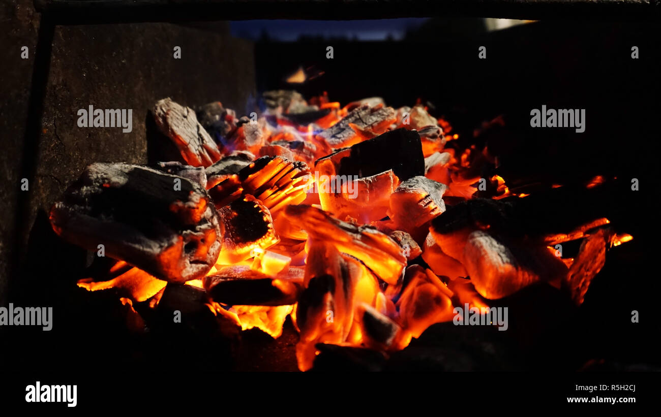 Embers fire fireplace grill fire flame, black background Stock Photo