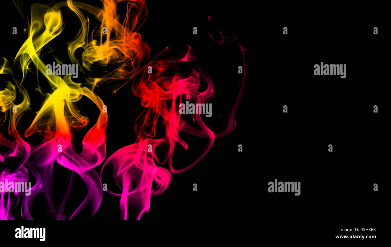 Colorful smoke on black background Stock Photo - Alamy