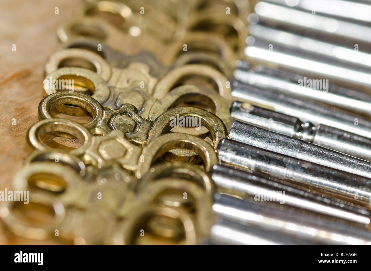 Row of Antique Pocket Watch Keys Laying on the Watchmakerâ€™s Bench