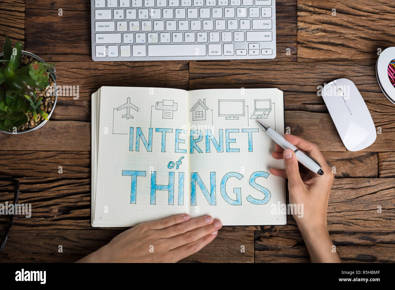 Businessperson Drawing IoT Concept Stock Photo