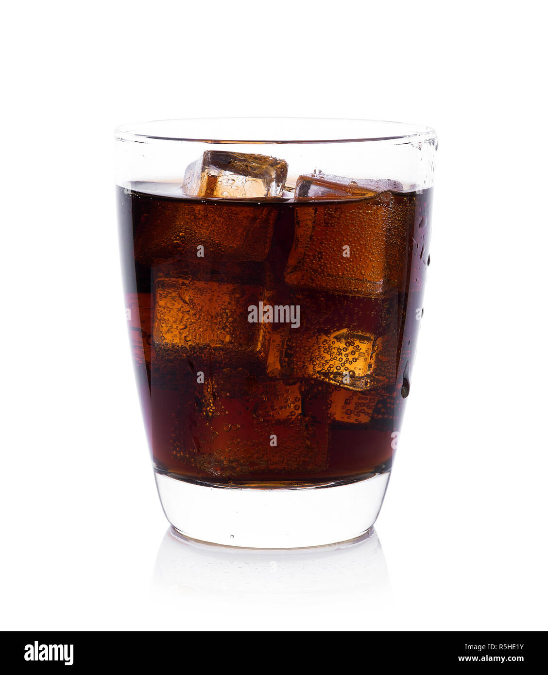 Cola in glass with ice cubes on white background Stock Photo - Alamy