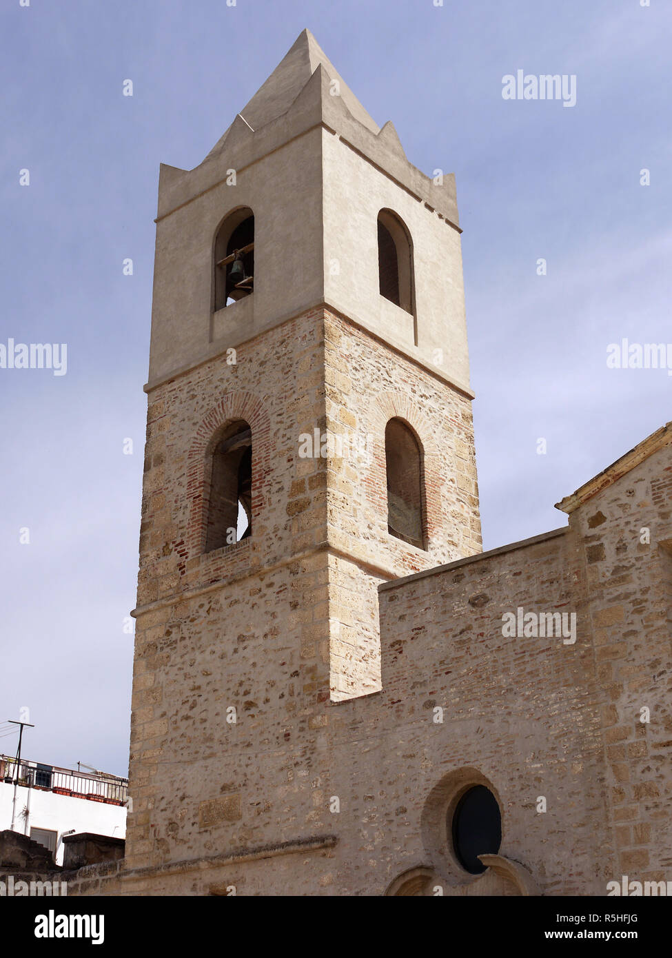 The tower of the church opposite the castle  of the hilltop town of Bernalda in Basilicata, Southern Italy Stock Photo