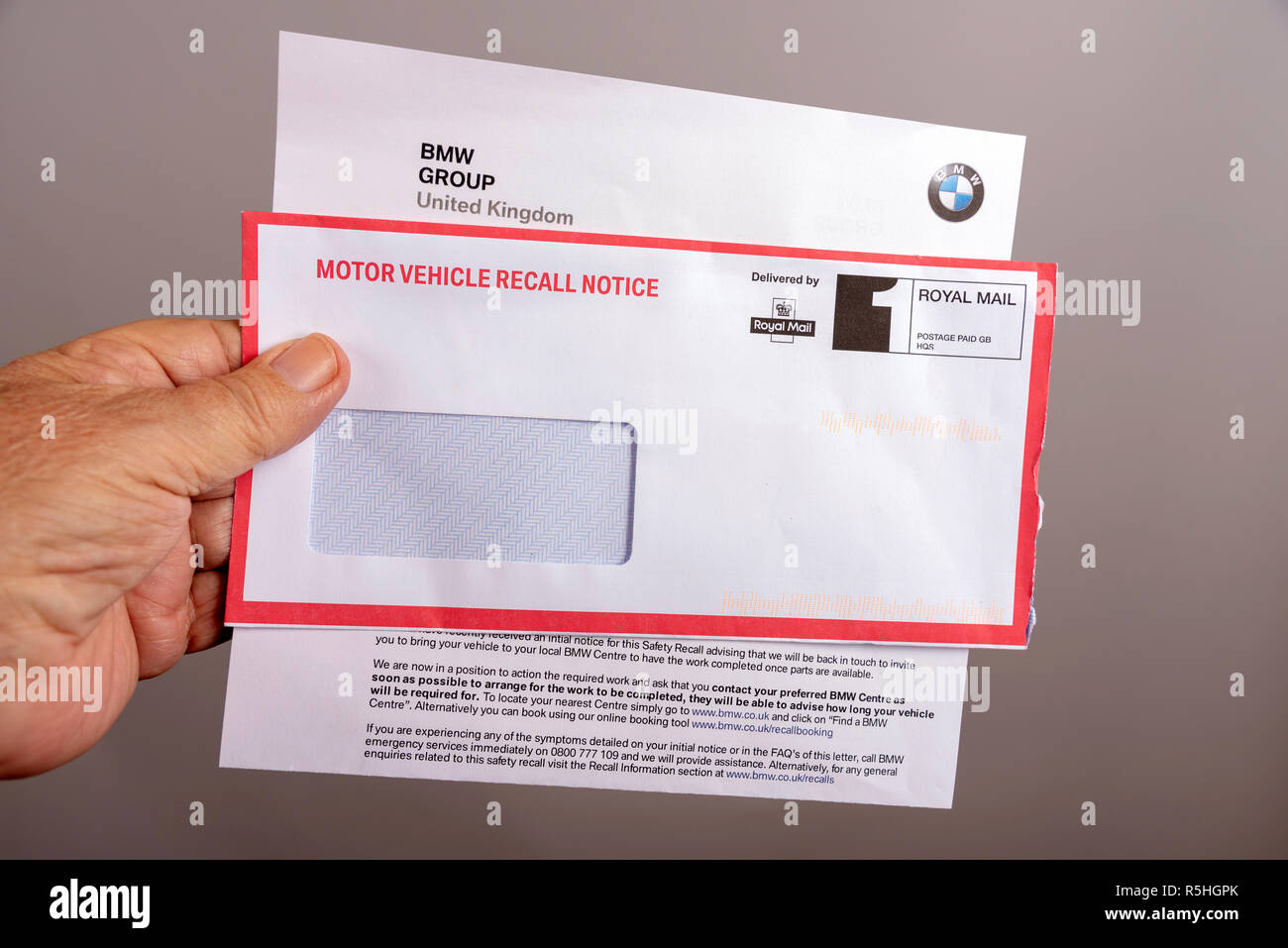 Official notification letter and envelope for BMW car vehicle safety