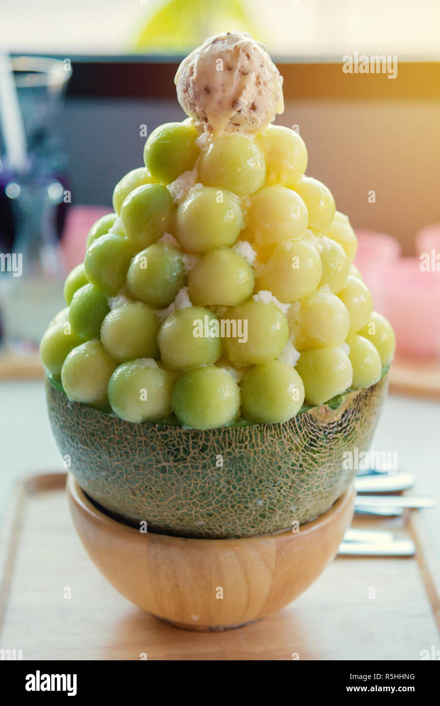 Melon Fruit with Sweetened condensed milk on Ice cream Stock Photo - Alamy