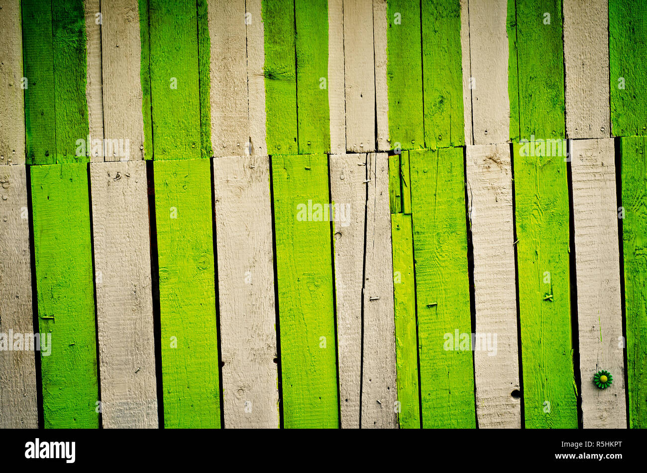 old wooden painted fence as a background Stock Photo - Alamy
