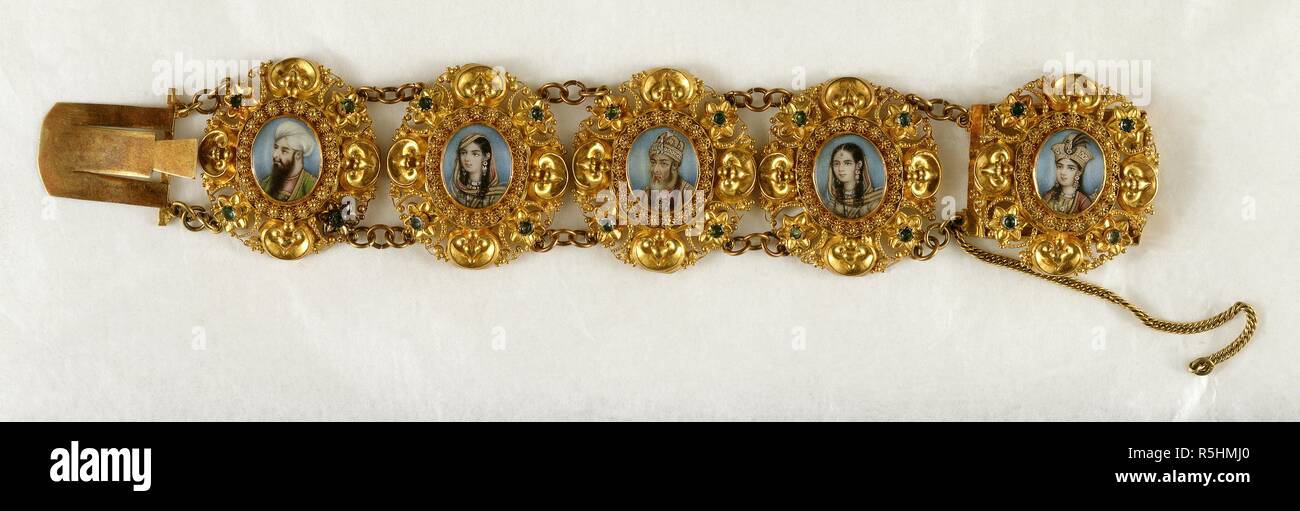 A gold bracelet set with emeralds and ornamented with five ivory miniatures of Dost Muhammad Khan, Bahadur Shah II and three Mughal court ladies. c.1864. Made by a Delhi artist and goldsmith, c.1864. Names inscribed on back of miniatures in English and in Persian script: â€˜Dost Mohommadâ€™;â€™ Moti Mahalâ€™;â€™ Bahadur Shah Mogulâ€™;â€™ Nur Jahanâ€™;â€™ Taj Mahal.â€™ Miniatures oval, water-colour on ivory; 0.625 by 0.5 ins. Source: Add.Or.2603. Language: Persian. Stock Photo