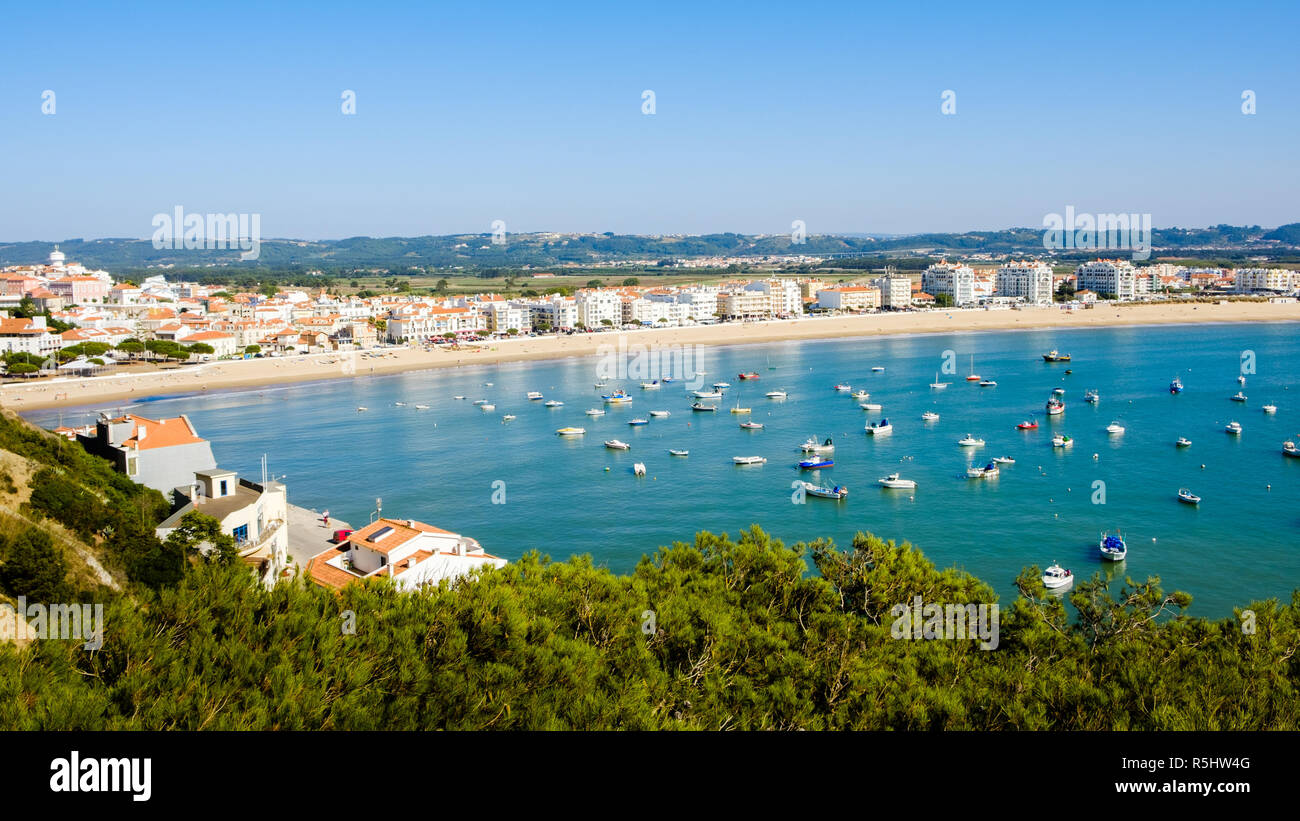 S. Martinho do Porto, Portugal - September 20, 2018 : Nearly closed sea bay, fine sand beach and clear water Alcobaca, Portugal Stock Photo