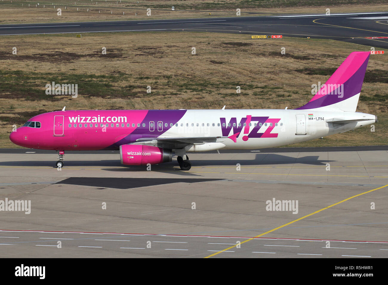 Hungarian Wizz Air Airbus A320-200 with registration HA-LPM taxiing to  terminal Stock Photo - Alamy