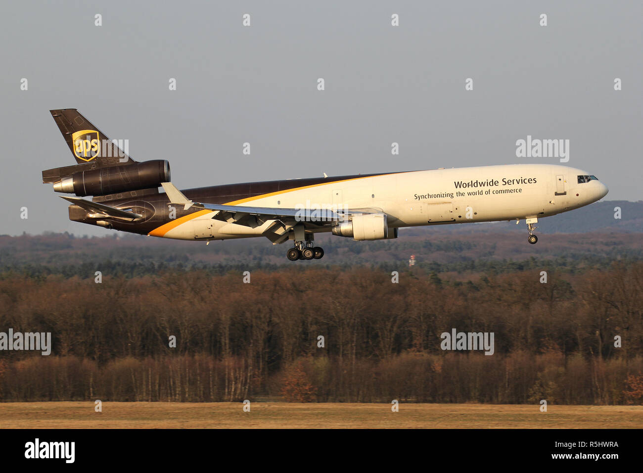 UPS McDonnell Douglas MD-11F with registration N295UP on short final for runway 14L of Cologne Bonn Airport. Stock Photo