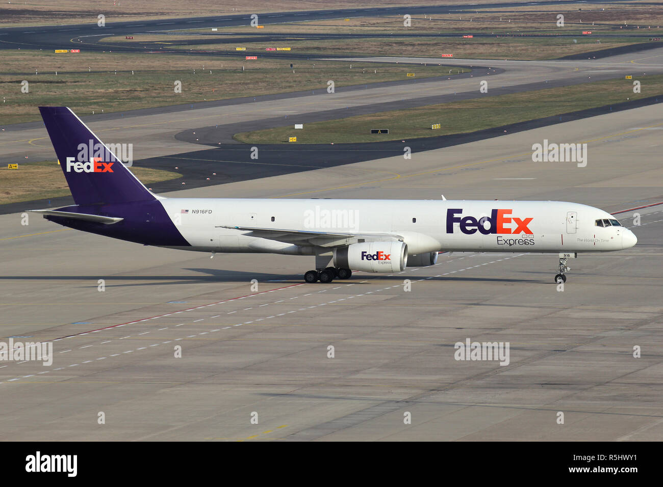 FedEx Boeing 757-200F with registration N916FD on short final for runway 14L of Cologne Bonn Airport. Stock Photo