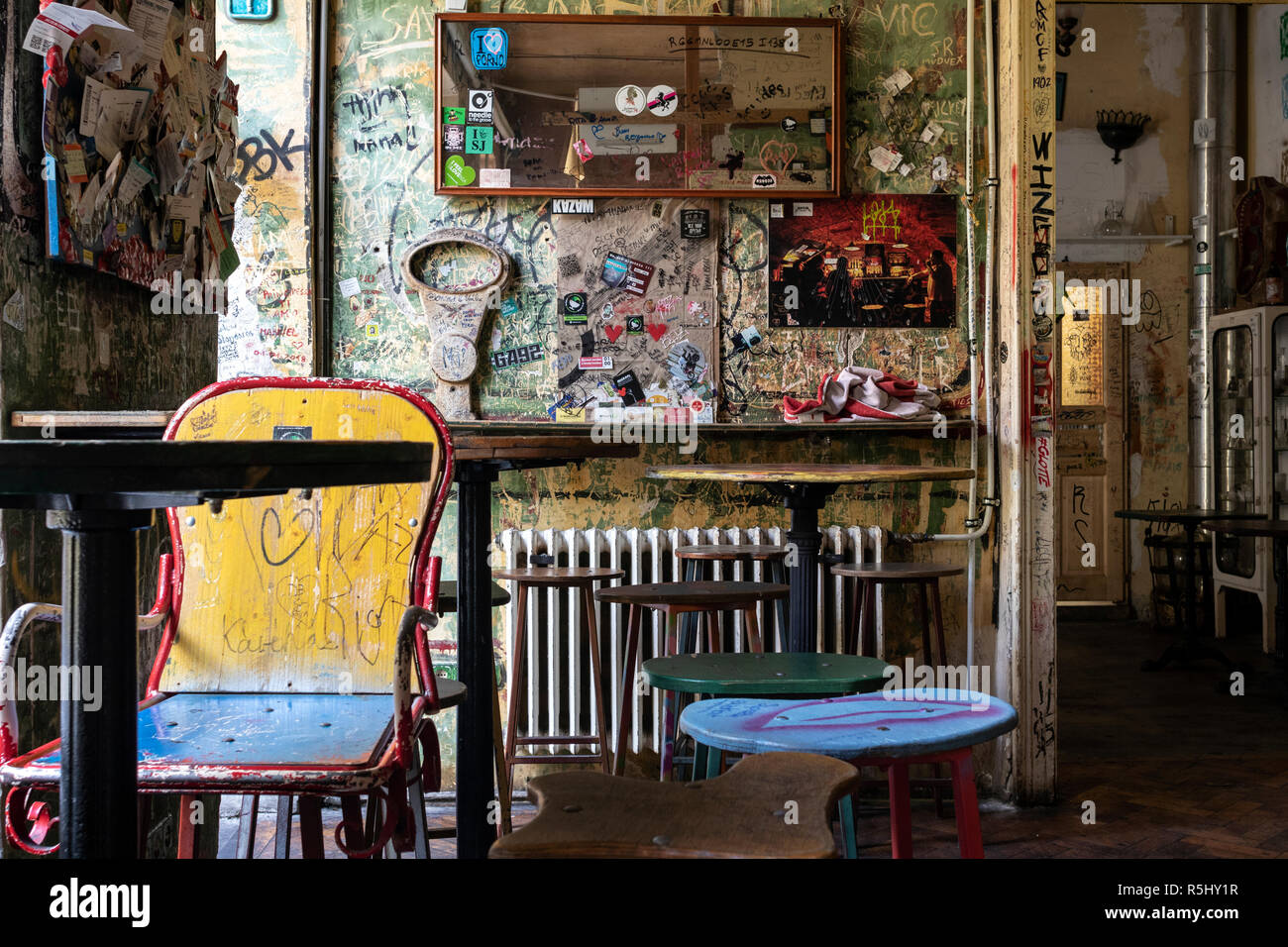 BUDAPEST, HUNGARY - August 12, 2018: Pub interiors with vintage furniture in Szimpla kert ruin pub and farmers market, a popular tourist destinations  Stock Photo