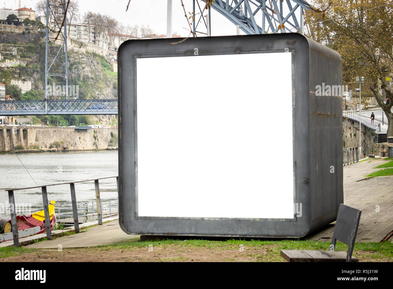 Download Mockup Of Big Silver Cube On The Street Near The River For Advertising Steel Bridge In The Background Stock Photo Alamy