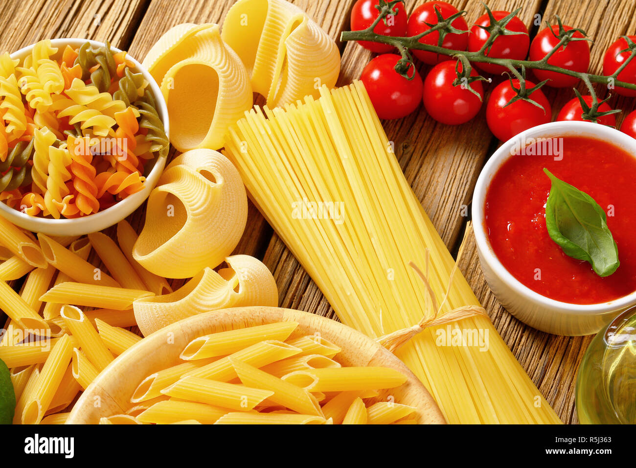Assorted pasta and tomato passata Stock Photo Alamy