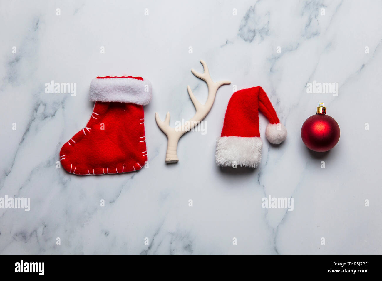 Christmas collection of decorations on a marble background Stock Photo