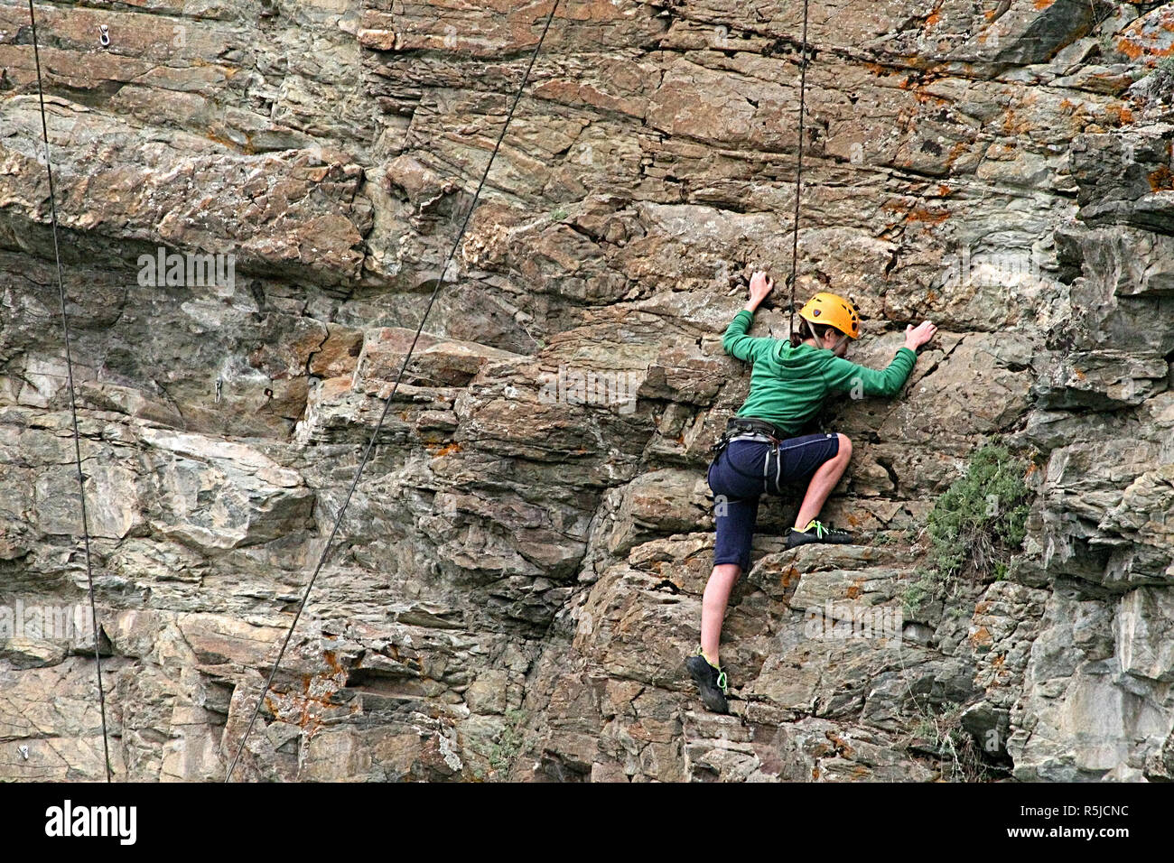 Rock repelling in the Yukon, Canada Stock Photo