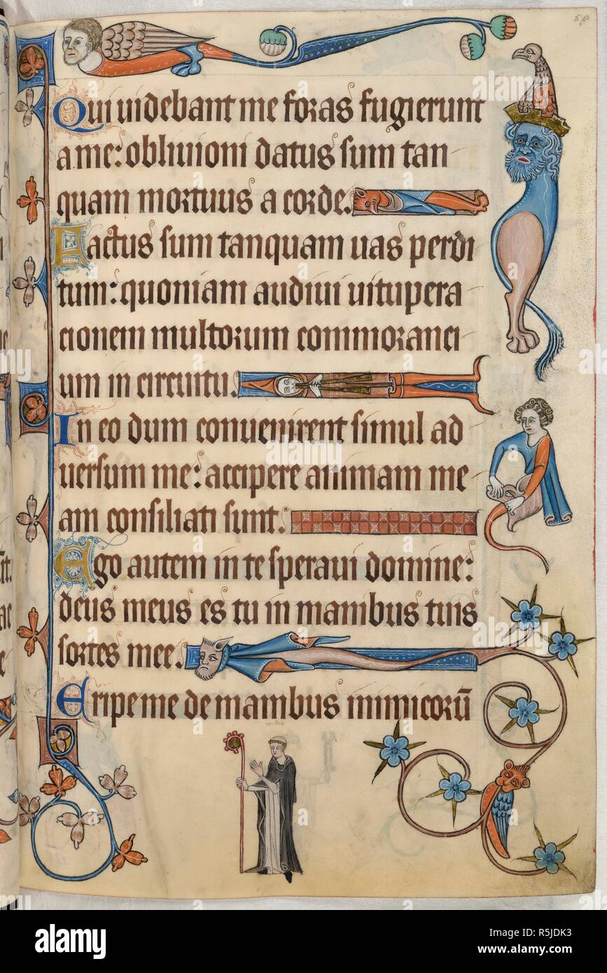 Psalm 30; St Augustine of Hippo. Luttrell Psalter. England [East Anglia]; circa 1325-1335. [Whole folio] Psalm 30. Grotesque line-fillers, including a hooded figure playing a double pipe. In the upper margin, a bird grotesque with human head. In the outer margin, a grotesque with a bearded king's head, wearing a bird-crested crown, with beast's clove-hoofed hindquarters. Below, another with the upper body of a youth prising apart the jaws of the beast coming out beneath his tunic. In the lower margin, an abbot, probably St Augustine, in a black and white habit, and holding a jewelled crozier   Stock Photo