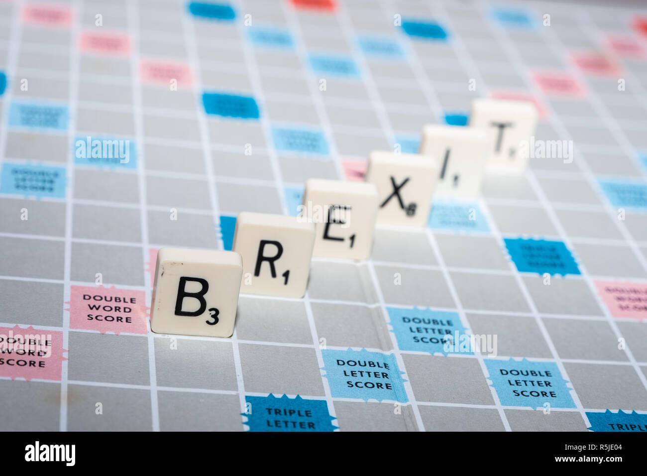 Scrabble pieces assembled to spell the word 'Brexit'. Stock Photo