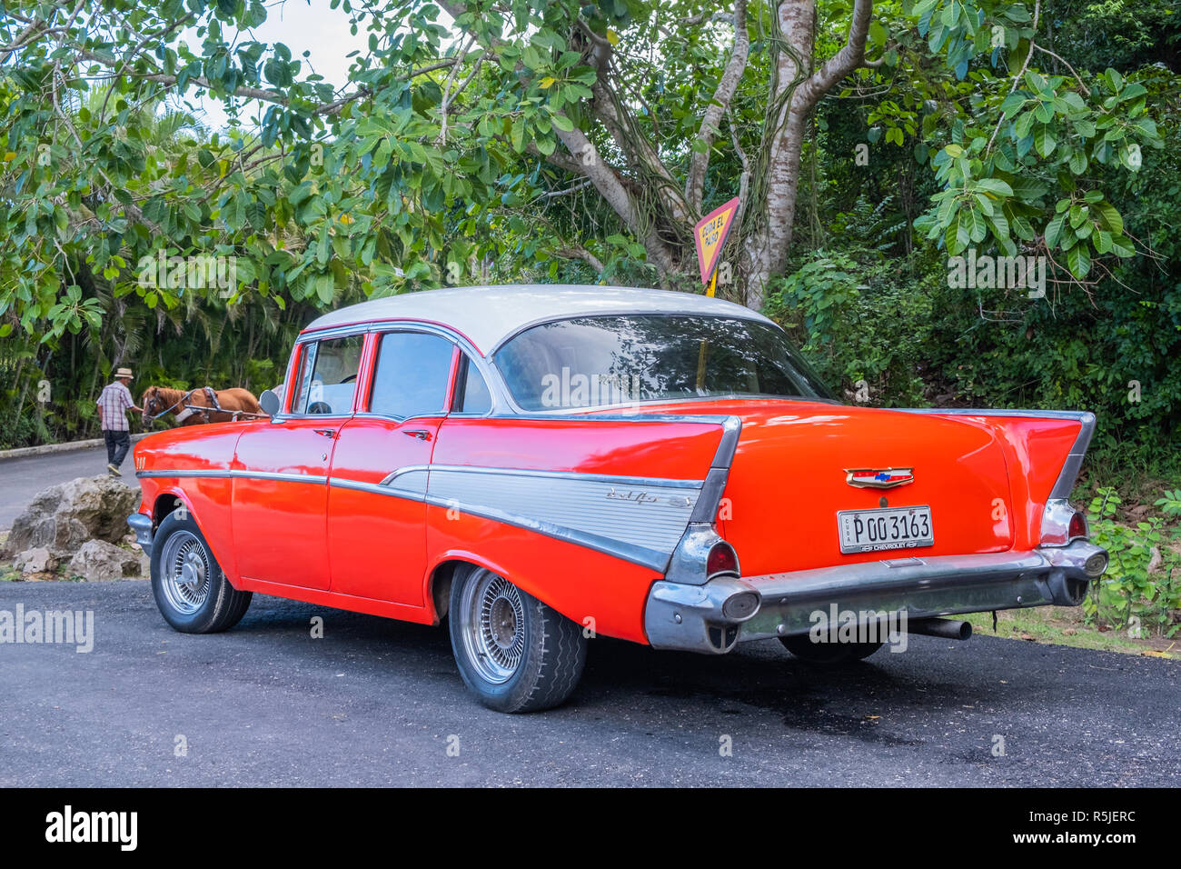Vintage red 1957 Chevrolet Bel Air parked on a road near Jibacoa Cuba. Stock Photo