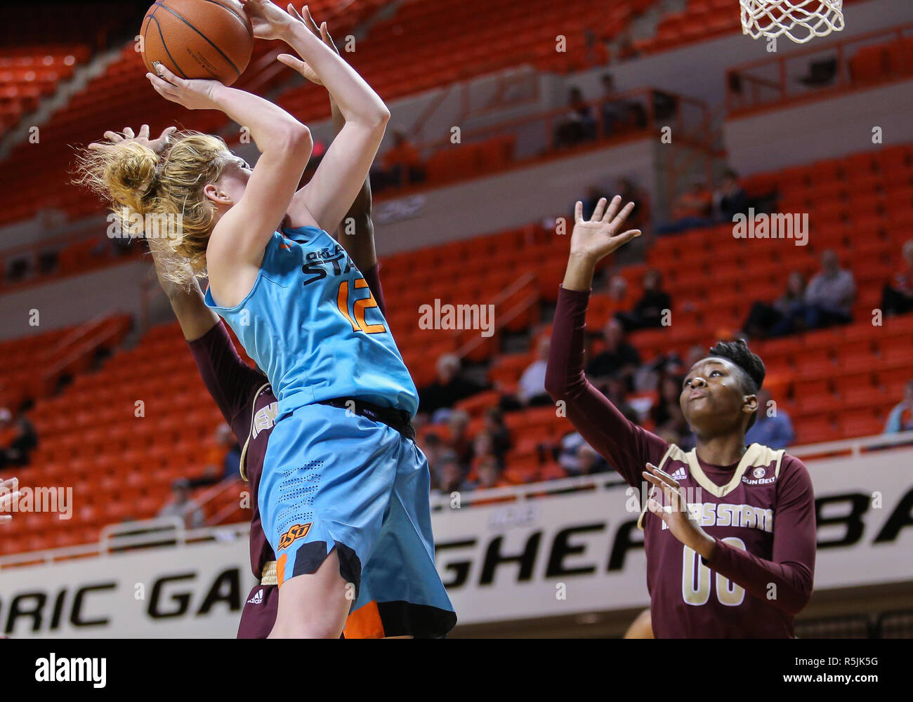 Stillwater, OK, USA. 30th Nov, 2018. Oklahoma State Forward Vivian Gray (12) attempts a shot during a basketball game between the Texas State Bobcats and Oklahoma State Cowgirls at Gallagher-Iba Arena in Stillwater, OK. Gray Siegel/CSM/Alamy Live News Stock Photo
