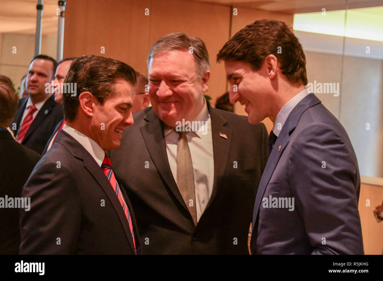 Buenos Aires, Argentina. 30th November, 2018. U.S. Secretary of State Mike Pompeo, center, chats with Mexican President Enrique Pena Nieto, left, and Canadian Prime Minister Justin Trudeau after the signing ceremony for the new NAFTA trade agreement known as USMCA November 30, 2018 in Buenos Aires, Argentina. Credit: Planetpix/Alamy Live News Stock Photo