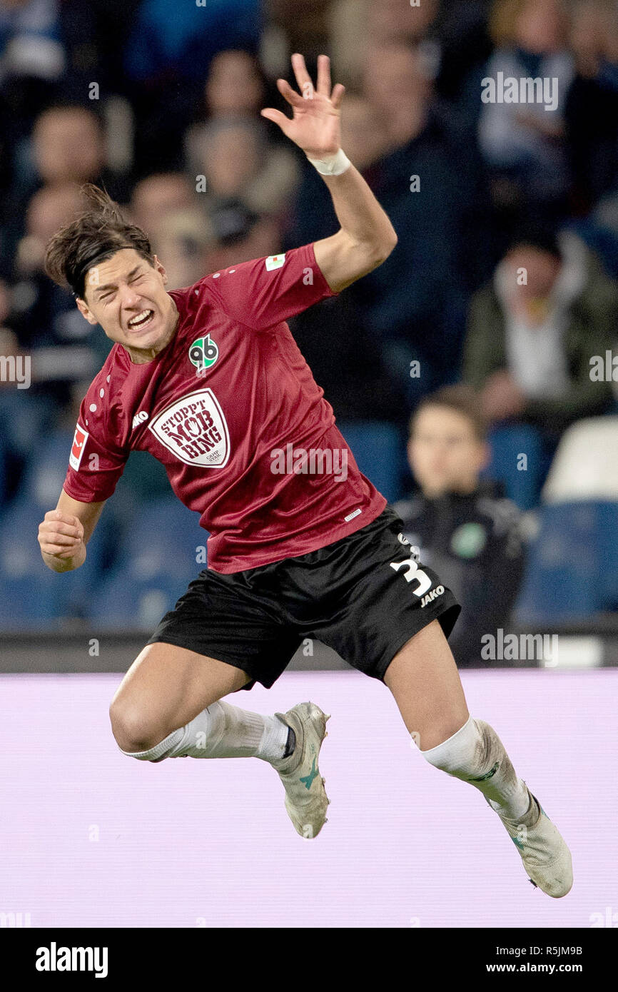 Hannover, Germany. 01st Dec, 2018. Soccer: Bundesliga, Hannover 96 - Hertha BSC, 13th matchday in the HDI Arena. Hanover's Miiko Albornoz jumps into the air. Credit: Swen Pförtner/dpa - IMPORTANT NOTE: In accordance with the requirements of the DFL Deutsche Fußball Liga or the DFB Deutscher Fußball-Bund, it is prohibited to use or have used photographs taken in the stadium and/or the match in the form of sequence images and/or video-like photo sequences./dpa/Alamy Live News Stock Photo