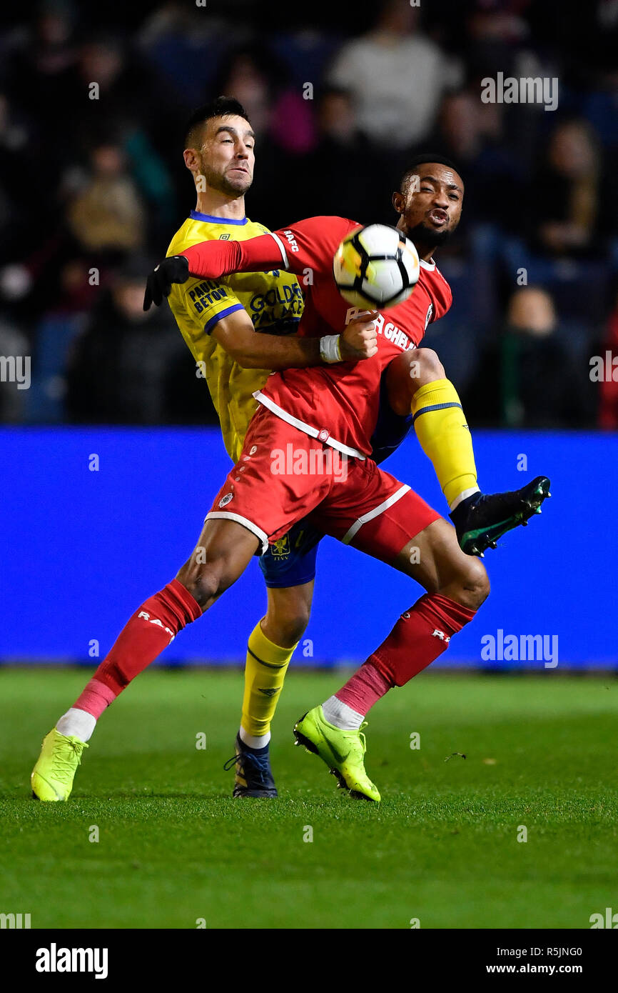 ANTWERPEN, BELGIUM - DECEMBER1 : Pol Garcia Tena and Jonathan Bolingi fight  for the ball during the Jupiler Pro League match day 17 between Antwerp FC  and STVV on December 01, 2018