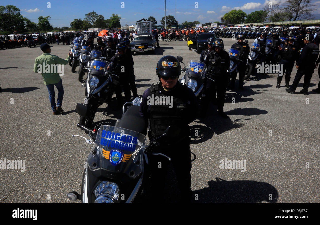 Valencia, Carabobo, Venezuela. 1st Dec, 2018. December 01, 2018. Security officers are kept vigilant around the Dracula car, during the act of starting the security operation Safe Christmas, in Valencia, Carabobo state. Photo: Juan Carlos Hernandez Credit: Juan Carlos Hernandez/ZUMA Wire/Alamy Live News Stock Photo