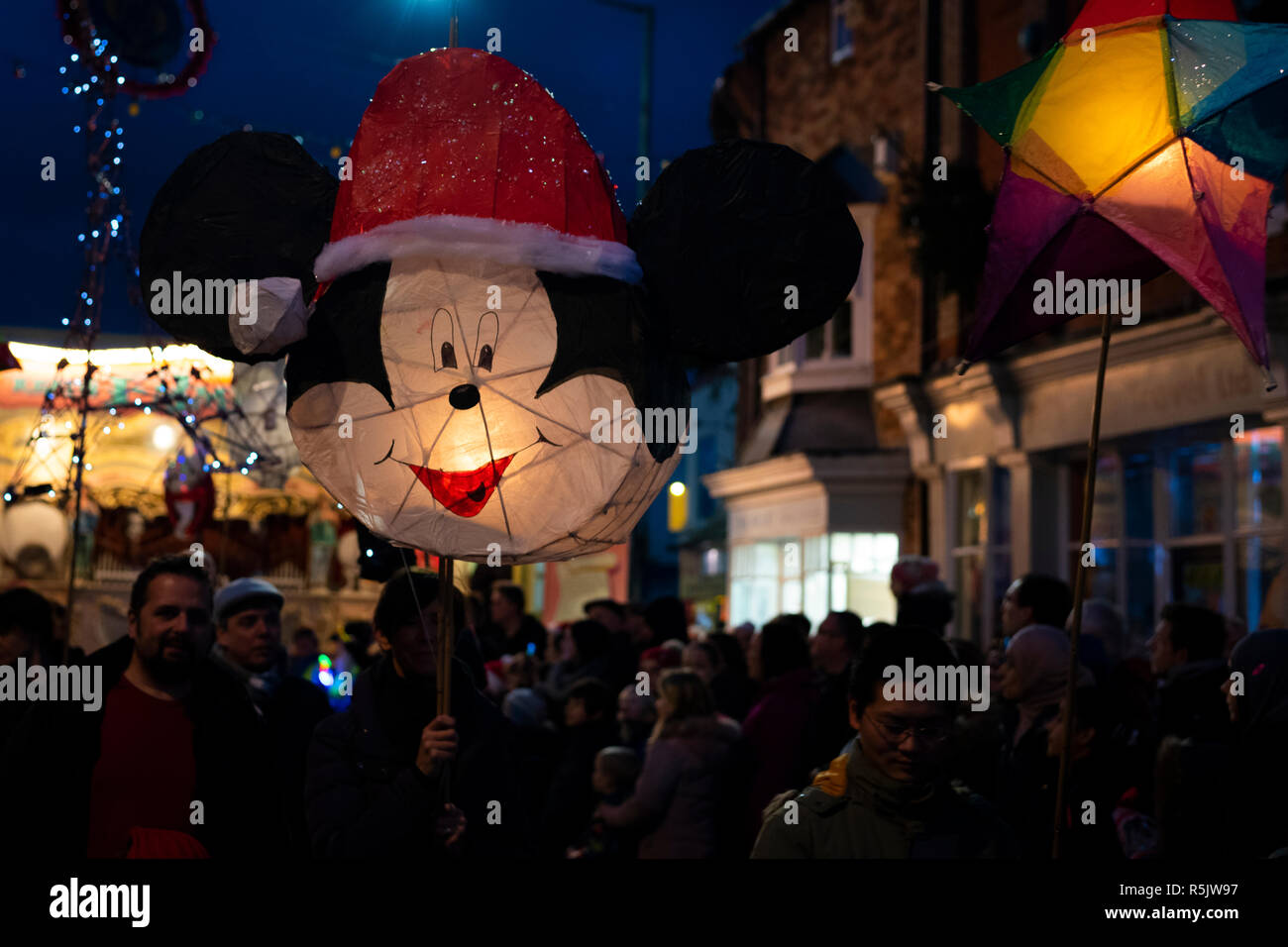 Milton Keynes, UK. 1st Dec, 2018. Over 200 lanterns join Stony Stratford Lantern Procession leading to the Christmas lights switching on ceremony. This year's theme for lanterns was 'Christmas at the movies.' Credit: David Isaacson/Alamy Live News Stock Photo