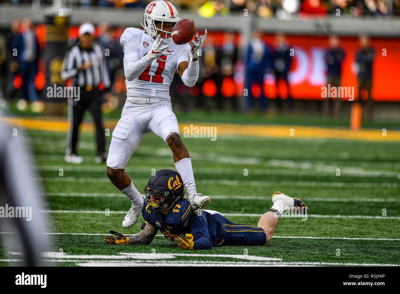 Berkeley, California, USA. 01st Dec, 2018. Stanford Cardinal cornerback Paulson Adebo (11) intercepts a bobbled pass during the NCAA football game between the Stanford Cardinal and the California Golden Bears at California Memorial Stadium in Berkeley, California. Chris Brown/CSM/Alamy Live News Stock Photo